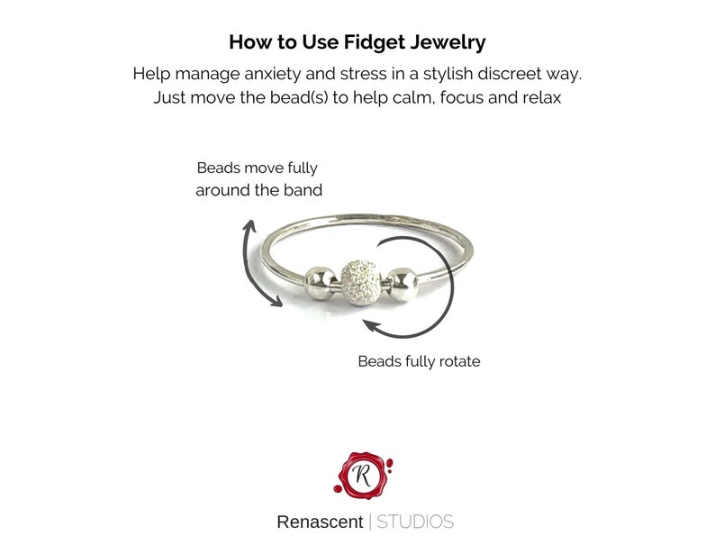 May include: Silver fidget ring with three beads. The center bead is larger and has a textured surface. The beads can be moved around the ring to help manage anxiety and stress.