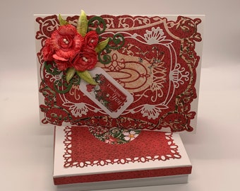 Handmade Thinking of You card with elaborate die cut layers accented with coral colored carnations and matching gift box