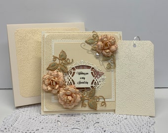 Elaborate Wedding Card in ivory, peach and pink with Handmade roses,  Pearl and butterfly accents.