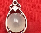 Grade A natural Jade Jadeite with sterling silver Pendant.