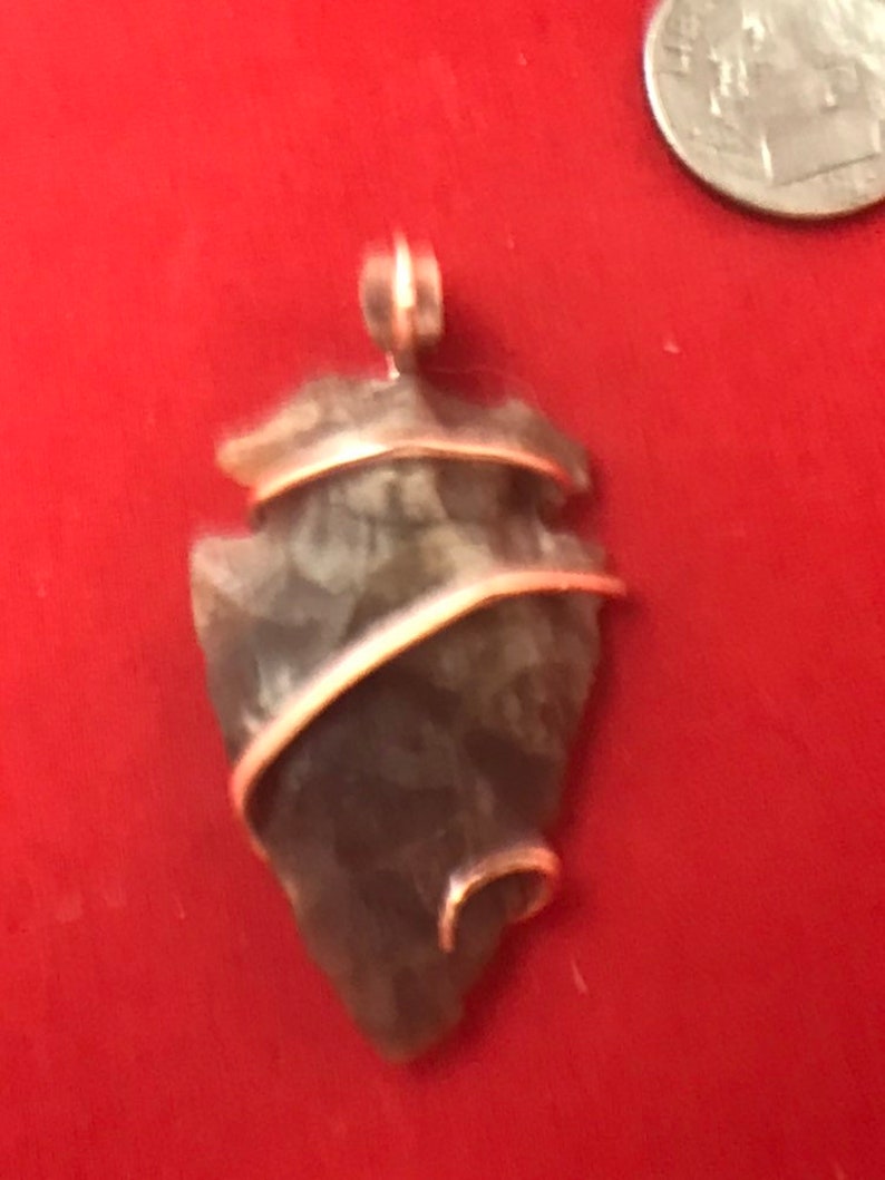 Jasper Arrowhead artfully set into a copper hand forged art wrap pendant