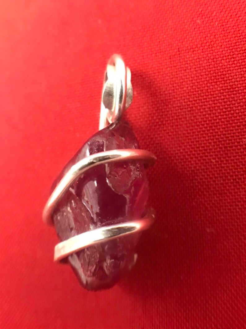 Natural Ruby set into a Sterling Silver art wrap pendant