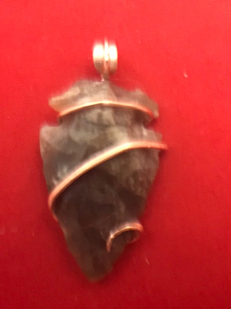 Jasper Arrowhead artfully set into a copper hand forged art wrap pendant