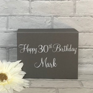 May include: Gray wooden box with white text that reads "Happy 30th Birthday Mark".