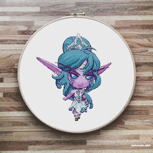 May include: A cross-stitch pattern of a purple and blue elf with a crown, wearing a white dress and holding a staff. The elf has blue eyes and a serious expression.