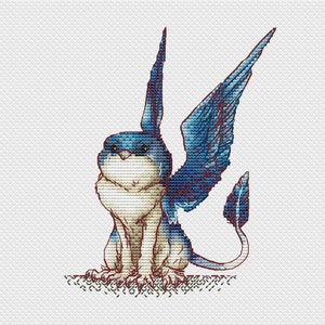 May include: A blue and white cross-stitch pattern of a mythical creature with wings and a tail. The creature has a fluffy white body and a blue head with a beak.
