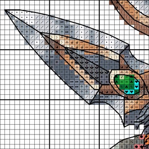May include: A cross stitch pattern featuring a detailed design of a bird with a green, blue, and brown wing. The pattern includes various symbols and arrows to guide the stitching process.