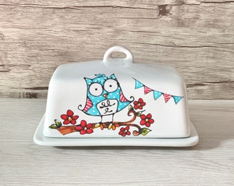 beurrier hibou fleurs rouge