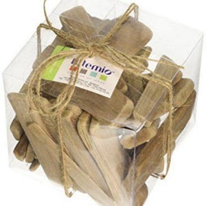 May include: A clear, square box filled with light brown wooden decorative pieces. The box is tied with twine and has a small tag with the word "temio" on it. The wooden pieces are various shapes, creating a natural, rustic aesthetic.