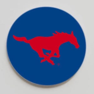 May include: A round, blue sticker featuring a red silhouette of a running horse. The horse is the central design element, set against a solid blue background. The sticker is likely for decorative purposes.