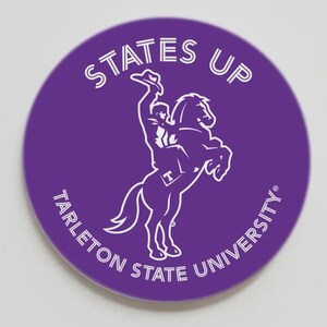 May include: A circular purple sticker featuring a white line-art graphic of a cowboy riding a rearing horse. The text STATES UP is arched above the graphic, and the text TARLETON STATE UNIVERSITY is arched below in a white sans-serif font.