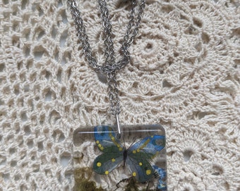 Blue butterfly pendant necklace