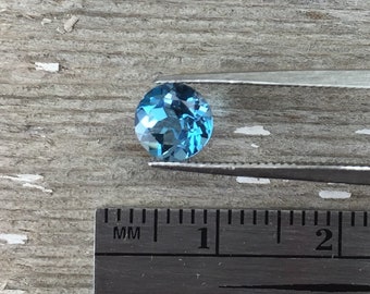 Swiss blue, one 5mm faceted blue topaz semiprecious gemstone