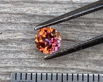 Mystic Sunrise, one 6mm faceted orange/deep pink topaz semiprecious gemstone