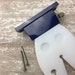 Clamp/holder for bench pins, holds our Perfect Bench Pin (not included), screws into wood bench or tabletop – exclusive! 