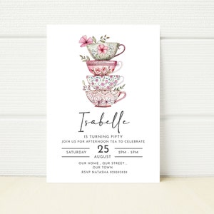 May include: A tea party invitation featuring a stack of four teacups adorned with pink and white floral designs. The invitation reads "Isabelle is turning fifty. Join us for afternoon tea to celebrate. Saturday, August 25, 2PM - 5PM. Our home, our street, our town. RSVP Natasha 929393939."