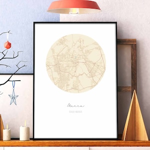 May include: A printable map of Mecca, Saudi Arabia, in a beige color scheme, with a black frame. The map is in a circle and the city name is written in cursive below the map.