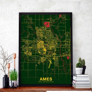 May include: A green and yellow map of Ames, Iowa, United States, with red accents. The map is framed in black and has the city name and state printed below the map.