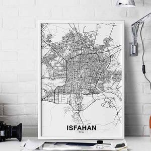 May include: A black and white city map print of Isfahan, Iran, in a white frame. The map shows the city's streets and landmarks. The print is titled "Isfahan, Iran".