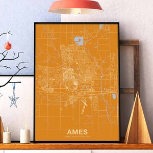 May include: A printable map of Ames, Iowa, United States, with orange background and blue lines. The map shows the city's streets, parks, and other features. The text "AMES, IOWA, UNITED STATES" is printed at the bottom of the map.