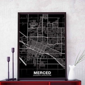 May include: Black and white city map print of Merced, California, United States. The print is framed in a black frame and has a white background.