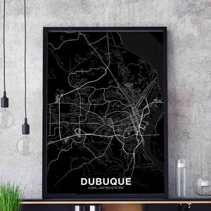 May include: Black and white city map print of Dubuque, Iowa, United States. The map is framed in a black frame and is hanging on a gray wall.