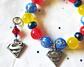 Beaded Charm Bracelet:  Super Hero Girls made with Acrylic Moon Beads!  Matching Hearing Aid Charms Available at a Discounted Bundle Price!