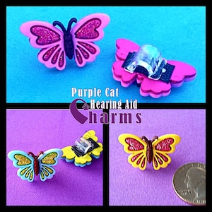 Cochlear Cuties o ciondoli a forma di tubicino per apparecchi acustici: farfalle scintillanti! 3 colori tra cui scegliere. Seleziona la quantità 2 per un paio!