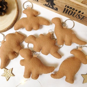 Llavero de pollo pepita de dinosaurio en fieltro hecho a mano, comida de fieltro, llavero de comida, pepita de dinosaurio, regalos divertidos