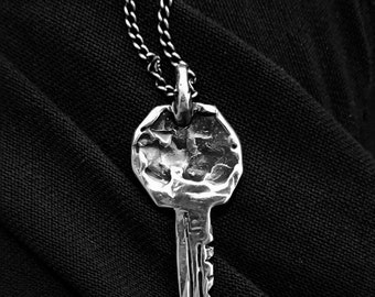 Hidden sterling silver key pendant