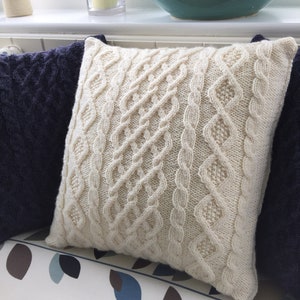 Three cable Aran cushion cover for 18 inch (45 cms) cushion pad. Knitting pattern. Instant PDF Download. Button back. Cables. Cosy. Pillow.