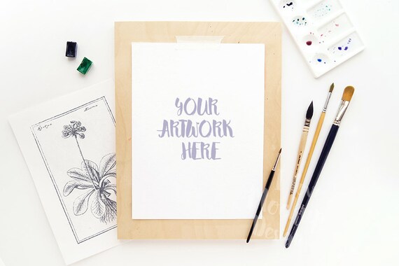 Artist Easel With Brushes And Palette On A White