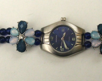 WA162 - Montre pour femme avec bracelet tendance de style floral bleu