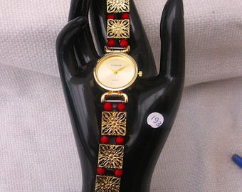 WA193 - Reloj de mujer con brazalete de moda rojo y dorado