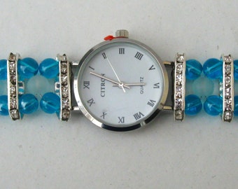 WA174 - Montre pour femme avec bracelet fantaisie bleu et argent