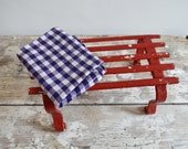 Red metal step stool, plant stand, caravan stool, vintage storage shelf.