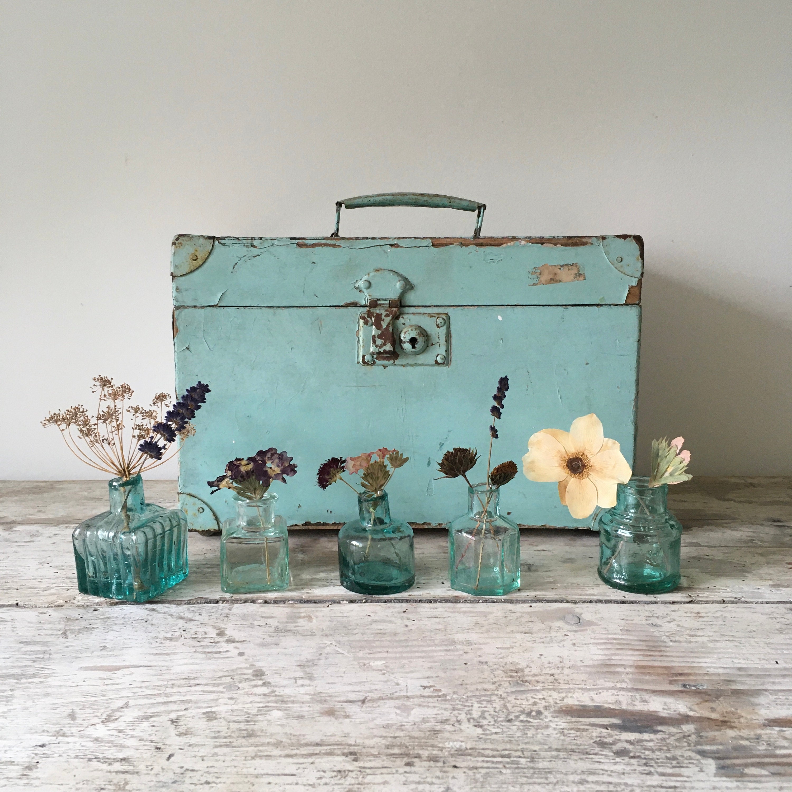 Set of 5 antique ink bottles.