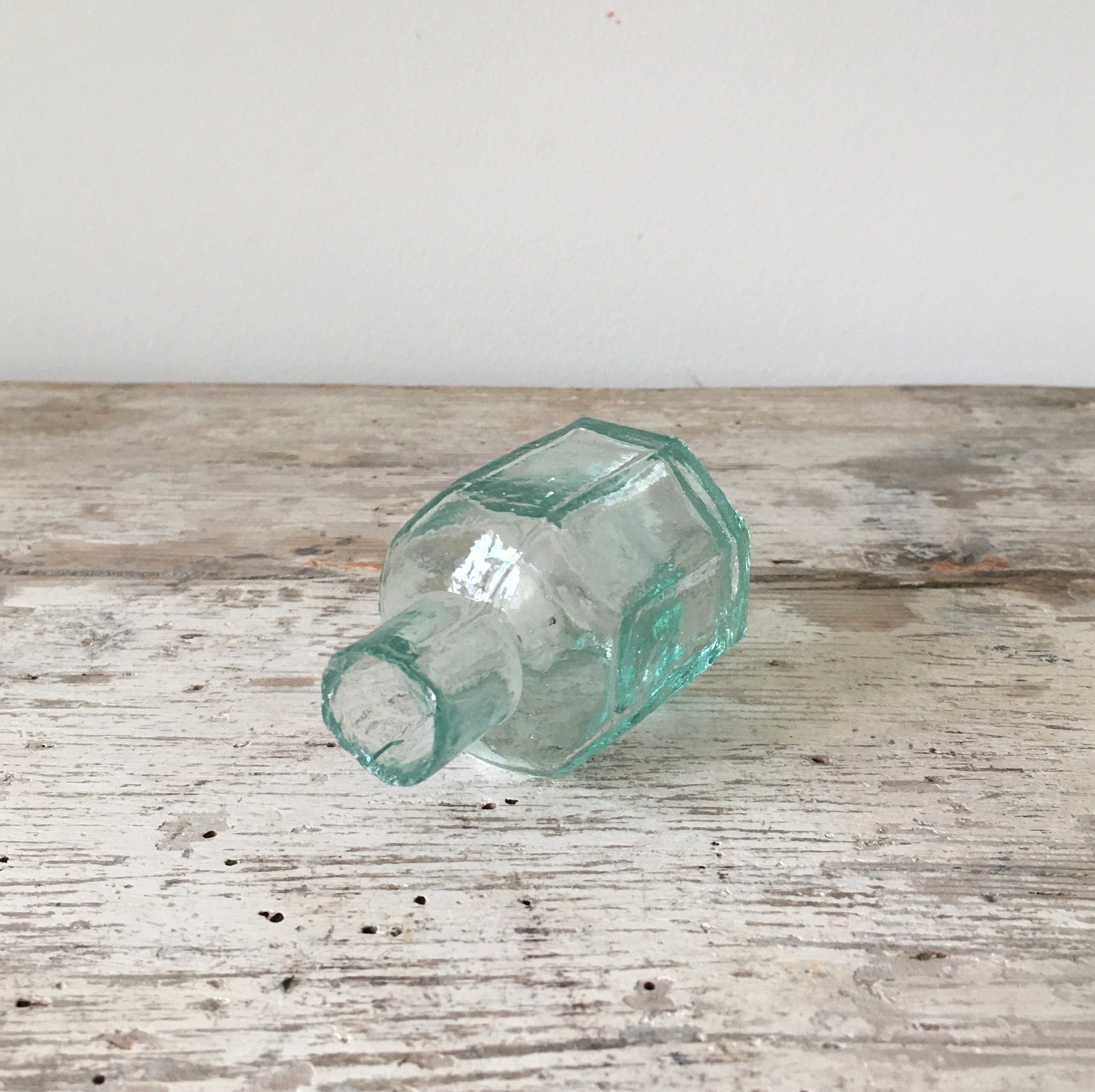 Set of 5 antique ink bottles.