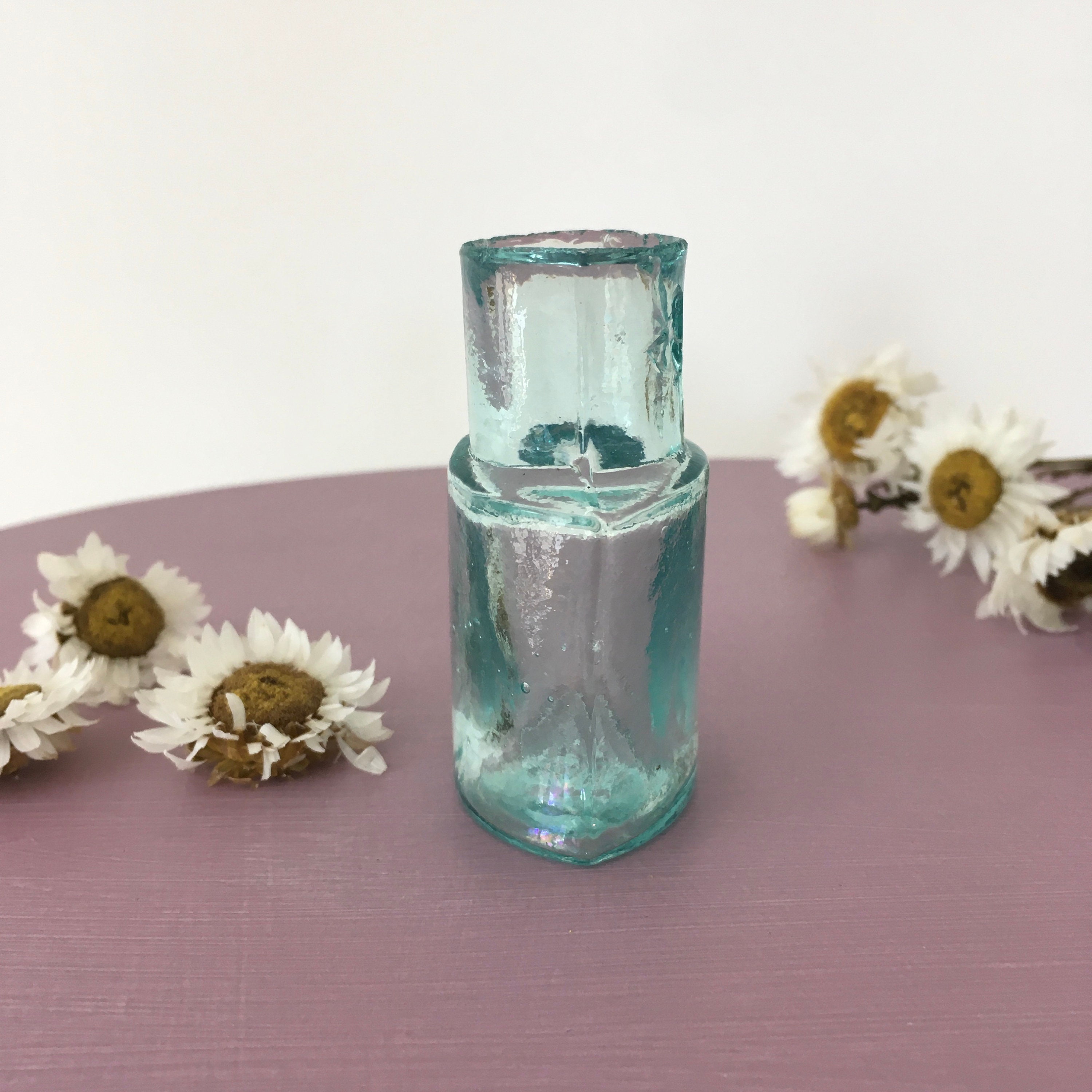 Set of 3 antique ink bottles.