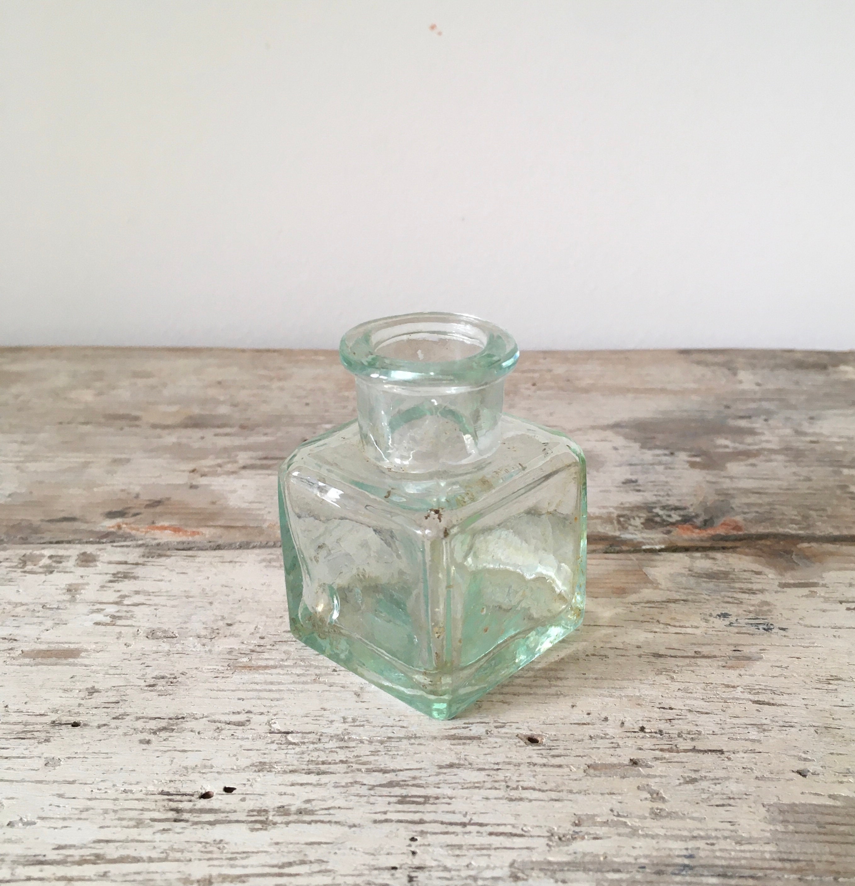 Set of 5 antique ink bottles.