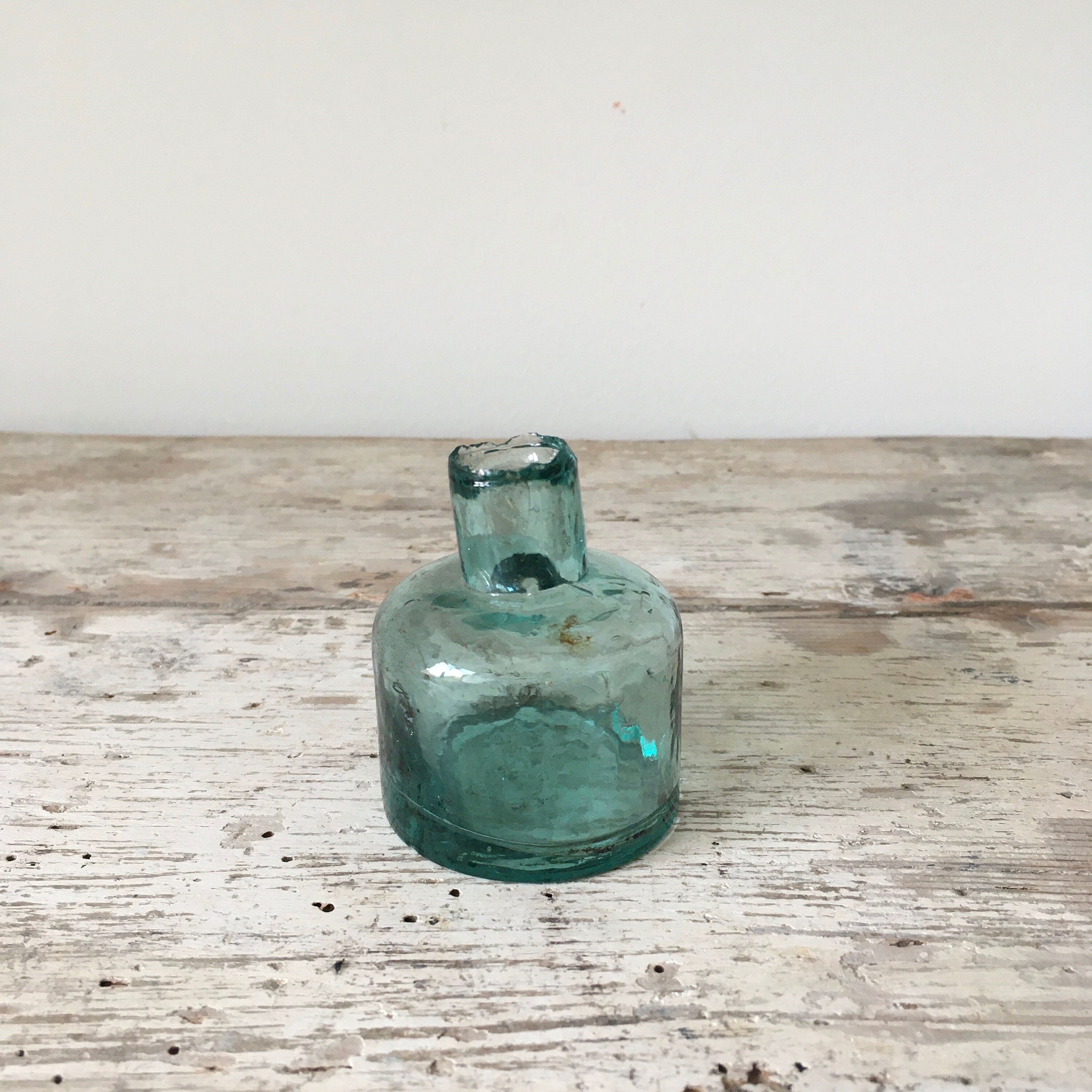 Set of 5 antique ink bottles.