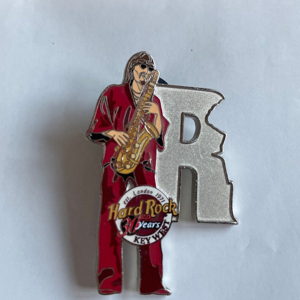 Hard Rock Key West Lapel Hat Collectible Pin Saxophonist “R”Musicians Series #3 out of 12, Hard Rock Cafe 2001 2”t 1 1/4”w 30 yr Anniversary