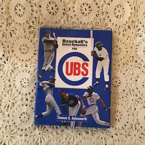 Baseball’s Great Dynasties “The Cubs” by Thomas Aylesworth  1990, NLB, HCDJ  history of team, players, photographs, Chicago sports Wrigley