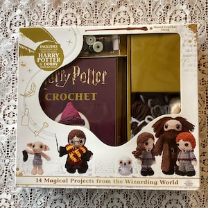 May include: A Harry Potter crochet kit with a book, yarn, and crochet hook. The kit includes materials to create 14 magical projects from the Wizarding World, including crochet figures of Harry Potter, Dobby, and other characters.