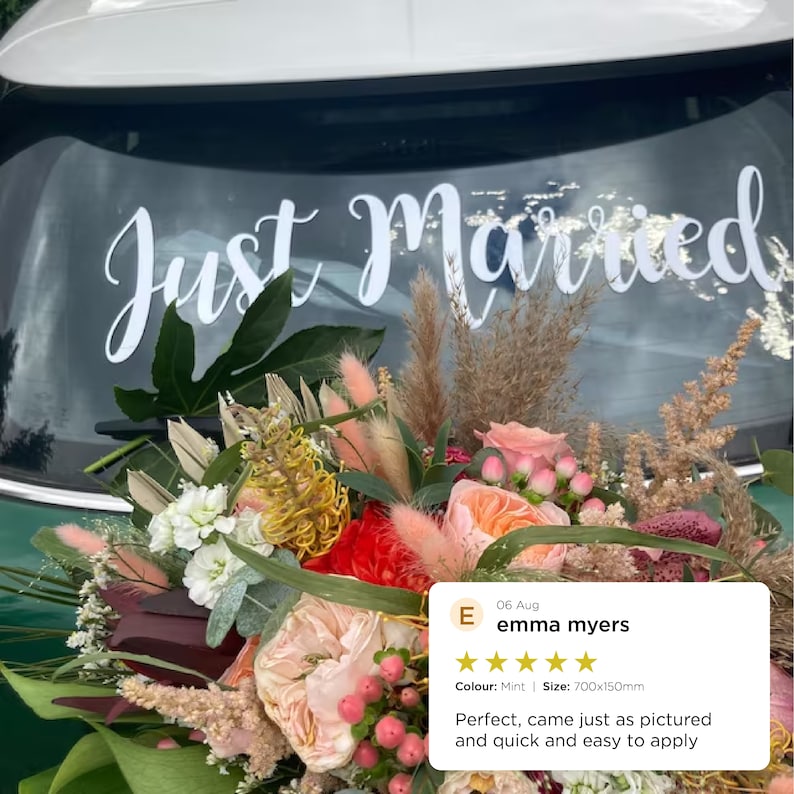 May include: A white "Just Married" car decal on a green car with a bouquet of flowers in front of it. The decal is 700mm by 150mm and is mint green in color. The review says "Perfect, came just as pictured and quick and easy to apply."
