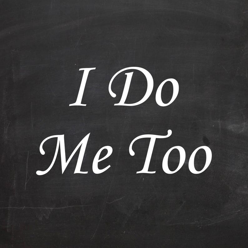 May include: A chalkboard with the text "I Do Me Too" written in white chalk.