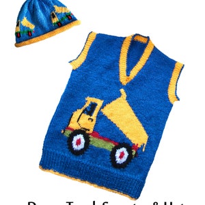 May include: A blue and yellow knitted sweater vest and hat set for a child. The sweater features a yellow dumper truck design. The hat is blue with yellow trim and has a small dumper truck design on the front. The text "Dump Truck Sweater & Hat" is printed below the image. The text "Double Knitting" and "26-32 inch chest" are printed below the title. The text "designs by Linda Moorhouse" is printed below the chest measurement.