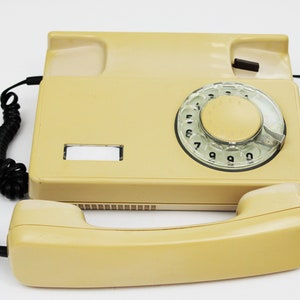 beige phone working desk telephone rotary phone vintage electronics antique gadget landline desk phone rare phone old school office decor