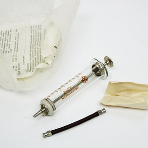 medical injection syringe medical instrument hospital tools medical device old needles doctors office decor hypodermic syringe glass device