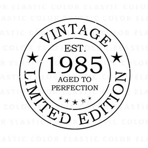 May include: Black and white vintage style stamp with the text "Vintage Limited Edition Est. 1985 Aged to Perfection" in a circle.